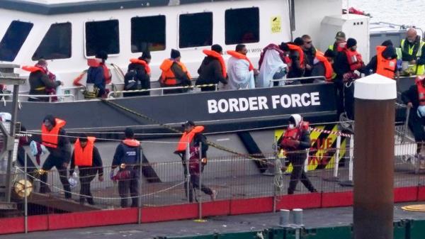 A group of people thought to be migrants are brought in to Dover, Kent, from a Border Force vessel on 16 September. Pic: PA